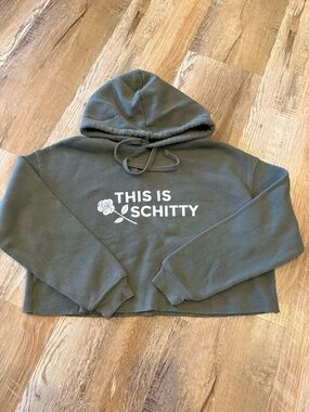 Schitts Creek - Olive Green Cropped Hoodie with White 'This Is Schitty' Graphic